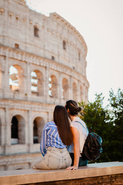 istock Tourist couple looking at Colosseum 1482867799