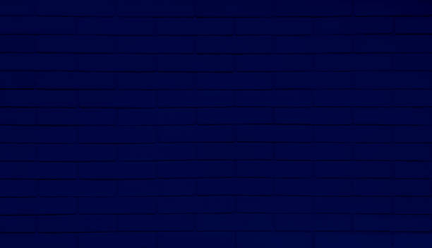 istock detail of a navy brick wall texture. dark blue painted modern brick wall used as panoramic background in close up view. 1482869583
