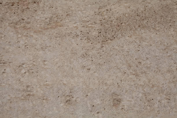 istock Brown and yellow porous abstract stone background 1482869687