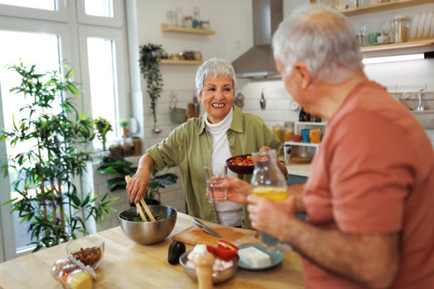 istock Senior couple in the kitchen 1482872043