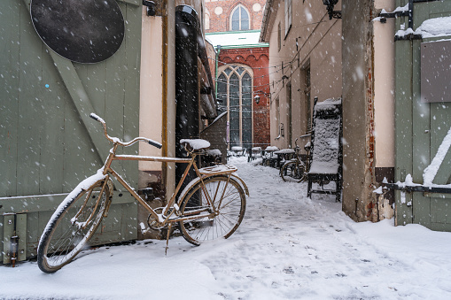 Bicycle at the entrance to the cafe in Old Riga, Latvia