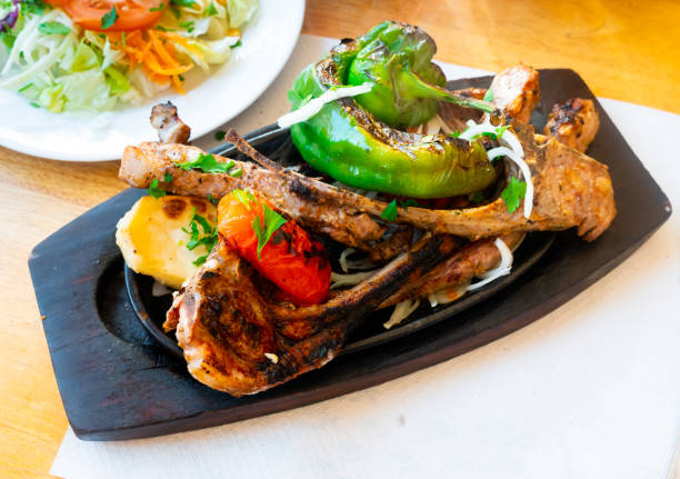 istock Lamb ribs with potato and vegetables 1482876283