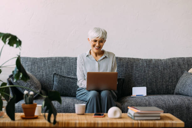 istock A Happy Beautiful Businesswoman Using Her Computer While Working From Home 1482877384