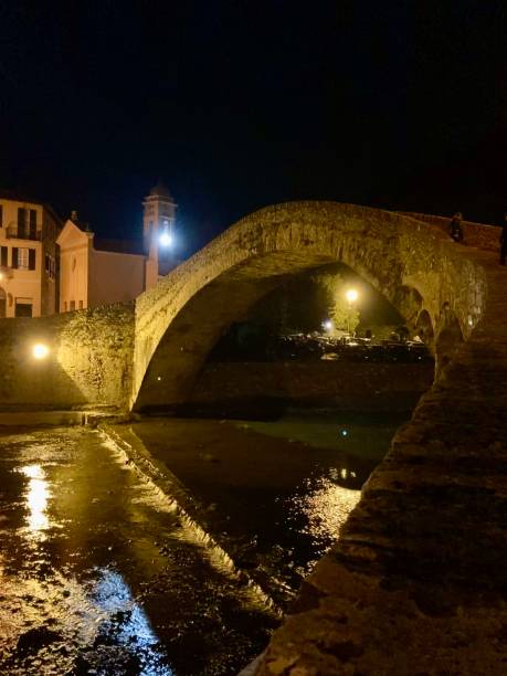istock The old bridge, Ponte Vecchio, at night, in Dolceacqua, Imperia, Italy. 1482881398
