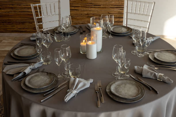 istock table setting. Interior of space is loft-style with tables 1482881814