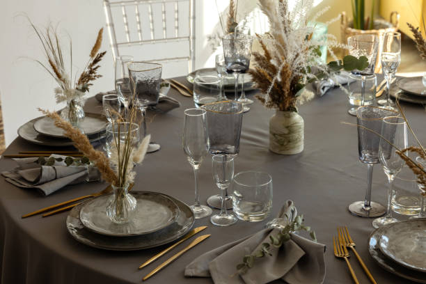 istock table setting. Interior of space is loft-style with tables 1482883060