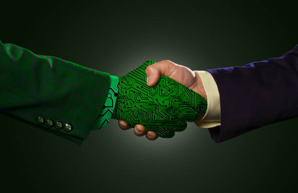 istock Handshake between an AI person and a human businessman 1482883648