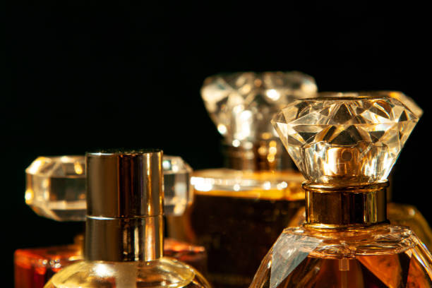 istock Set of perfume bottles on black background. 1482887667