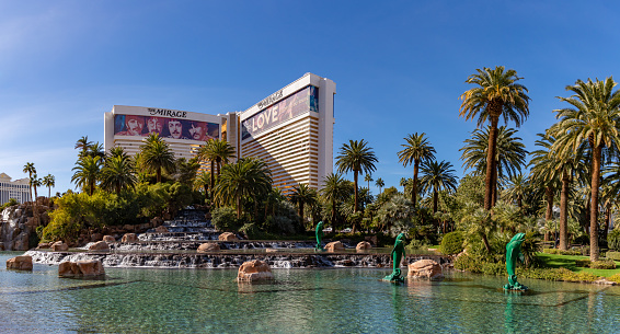 Las Vegas, United States - November 24, 2022: A picture of the Mirage and the surrounding pond and palm trees.