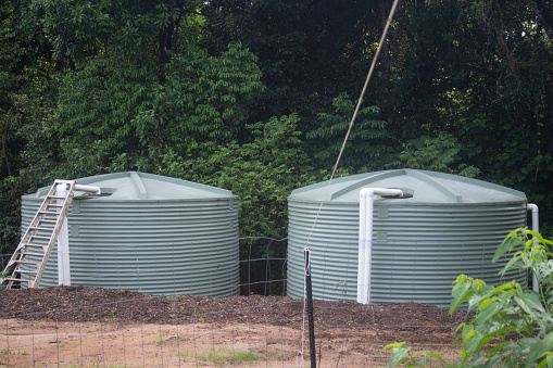 Two assembled Rainwater Storage Tanks on acreage Surrounded by Rainforest, Far North Queensland, Australia