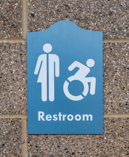 istock A public restroom sign on a brick wall 1482891639