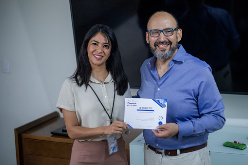 Presenting diploma to speaker