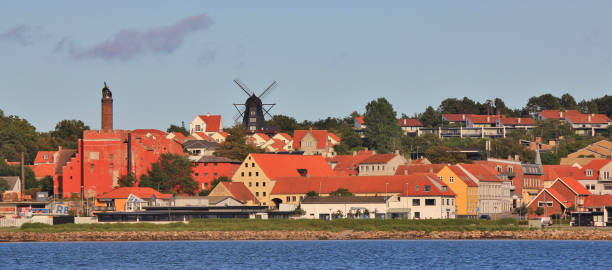 istock Old windmill and other buildings in Ebeltoft, Denmark. 1482896957
