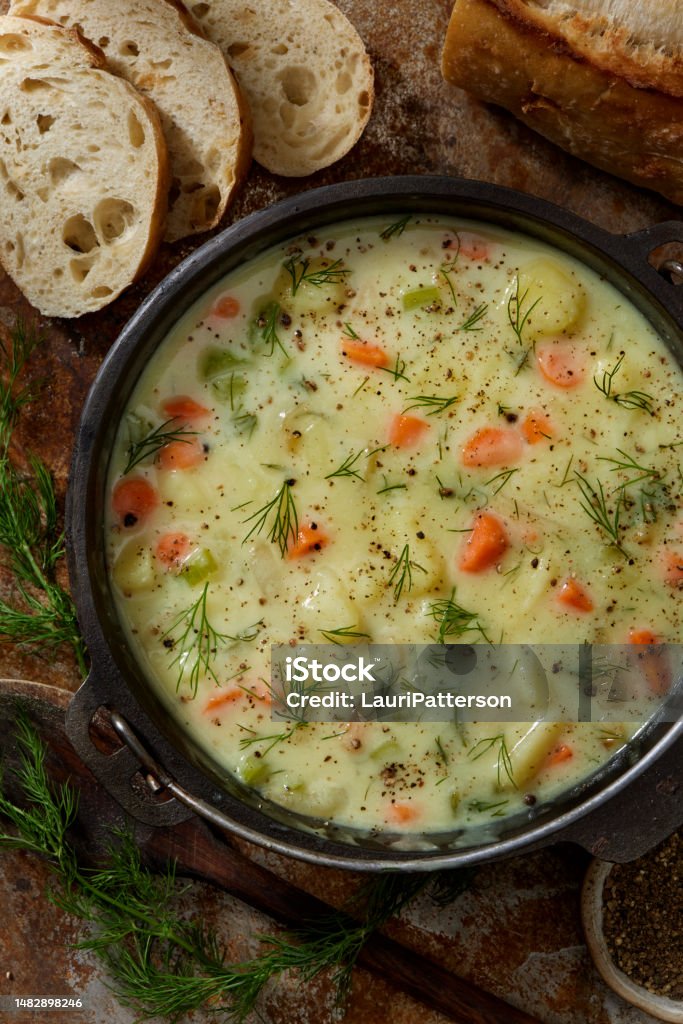 Creamy Polish Dill and Potato Soup Creamy Polish Dill and Potato Soup with Carrots, Celery and Bread Soup Stock Photo