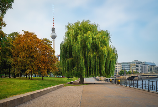 Spree River Promenade at James Simon Park with TV Tower (Fernsehturm) on background - Berlin, Germany