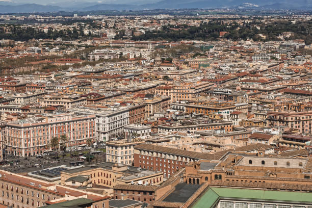 Rome at dusk. View from Viewpoint Viale del Belvedere. In the background top left is the Vittoriano or also called Altare della Patria (Altar of the Fatherland). Often also playfully called \