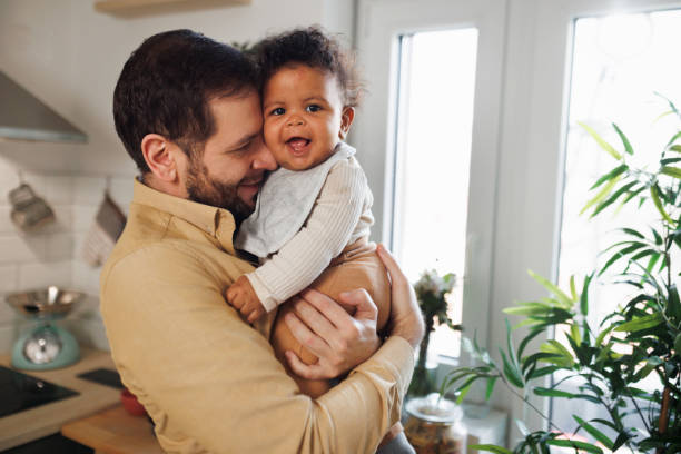 istock Father and baby boy at home 1482911162