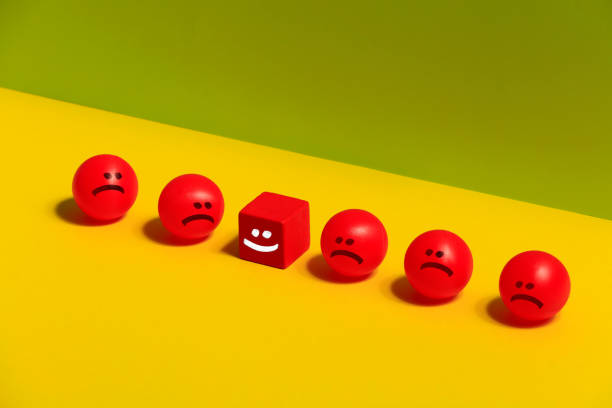 The smile cube which is symbolized by geometric shapes and located where it does not belong