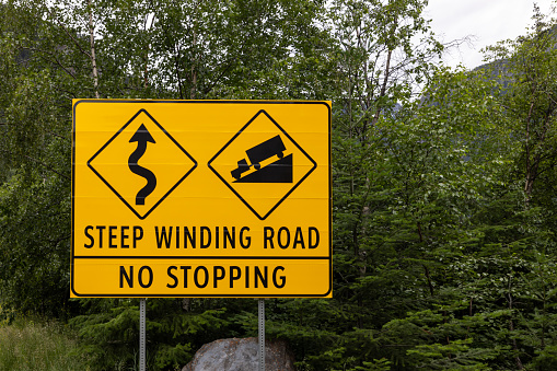Steep Winding Road Sign on Highway 99, Whistler, British Columbia, Canada