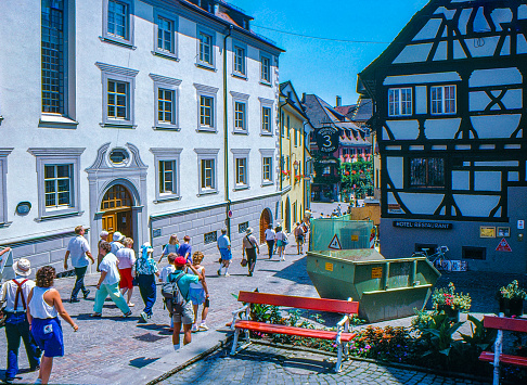 Meersburg, Germany - July12,  1989: Tourist are walking on the street. 1989 old Positive Film scanned, MEERSBURG on Bodensee - Lake Constance, Meersburg, Germany.