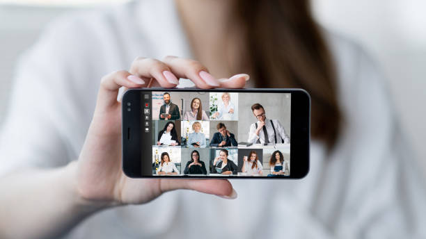 istock mobile conference business webinar group on phone 1482945009