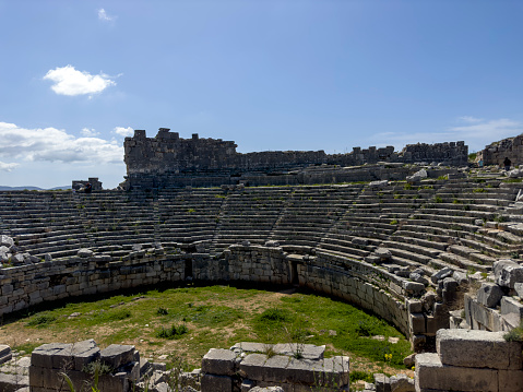 Tourists at the Famous Historical Roman amphitheater at Caesarea