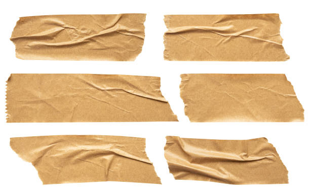 istock Brown adhesive paper tape set isolated on white background 1482955173