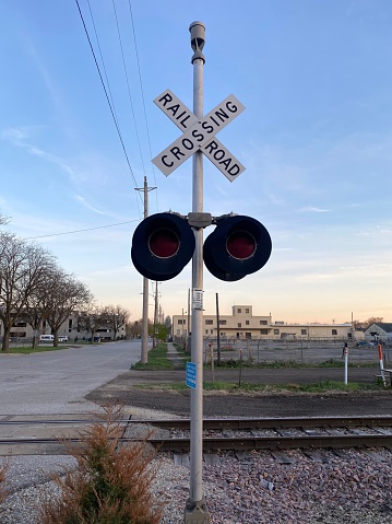 Railroad crossing sign and signal