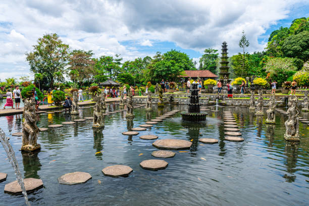 views of tirta gangga garden in bali candi dasa, indonesia. 7th march, 2023: tirtaganga is a famous park with many pools and gardens located in bali, indonesia tanah lot stock pictures, royalty-free photos & images
