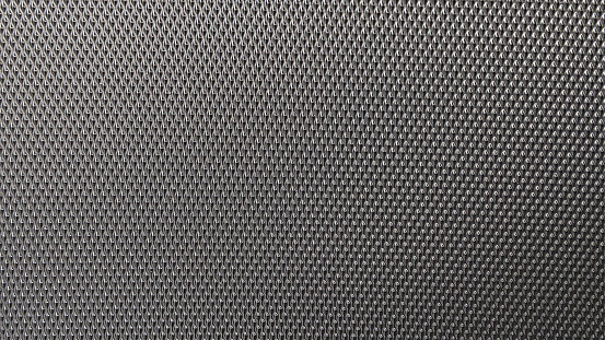 Abstract carbon fiber fabric, with black carbon fiber texture.