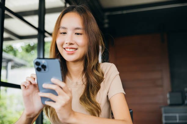 istock female hands holding and typing to communicate with others through on mobile phone 1482967149