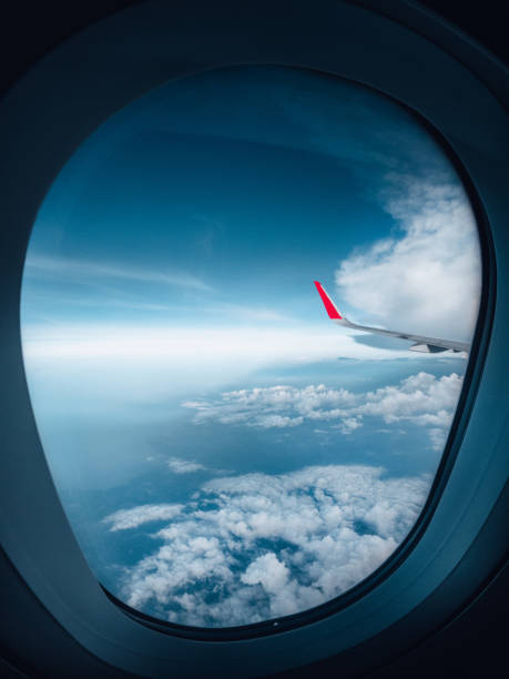 istock flying and traveling, view from airplane window 1482968888