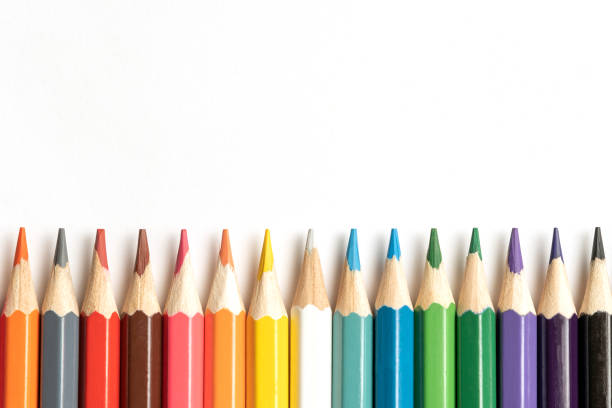 istock Colored pencils lie in a row. A line drawn with pencil tips. Set of crayons for illustrations, art, study. Ready for school. 1482969888