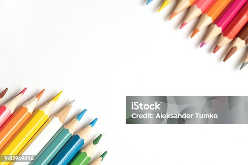 istock Colored pencils lie in a row. A line drawn with pencil tips. Set of crayons for illustrations, art, study. Ready for school. 1482969896
