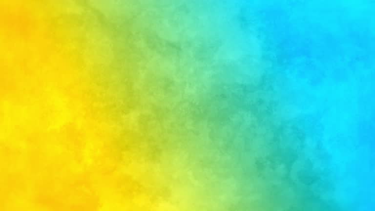 Mixing the blue and yellow paints smoothly, motion loop 4k background at 60fps.