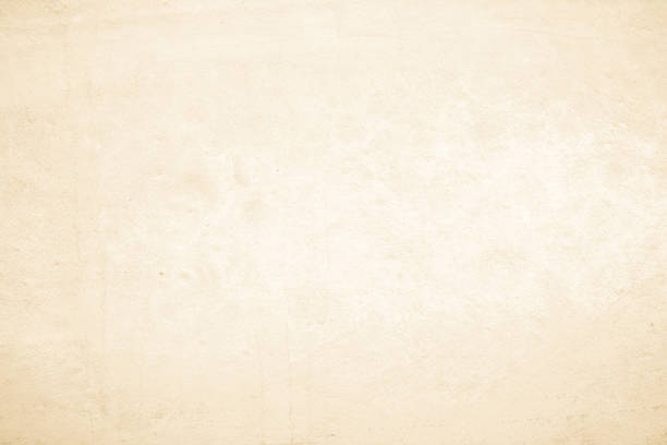 istock Old concrete wall texture background. Close up retro plain beige color cement material surface rough for show or advertise promote product content on display and brown paper design element concept. 1482971013