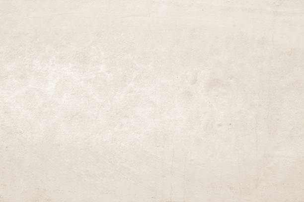 istock Old concrete wall texture background. Close up retro plain beige color cement material surface rough for show or advertise promote product content on display and brown paper design element concept. 1482971015