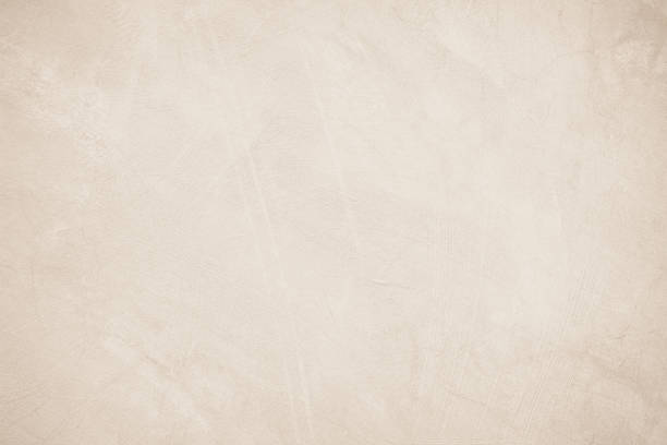 istock Old concrete wall texture background. Close up retro plain beige color cement material surface rough for show or advertise promote product content on display and brown paper design element concept. 1482971023
