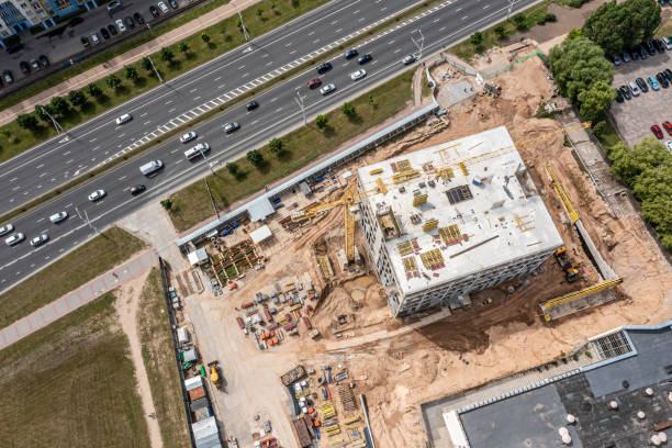 istock city construction site viewed from above. new concrete building under construction. 1482973027