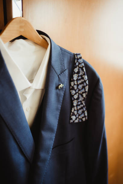 istock Men's dress clothes on a hanger 1482976145