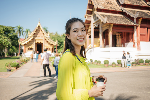 Thai tourist sightseeing at travel in Wat Phra Singha Temple at chiang mai thailand in winter morning