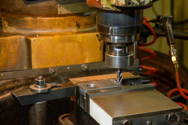 istock The drilling process on NC milling machine with brass material. 1482981423