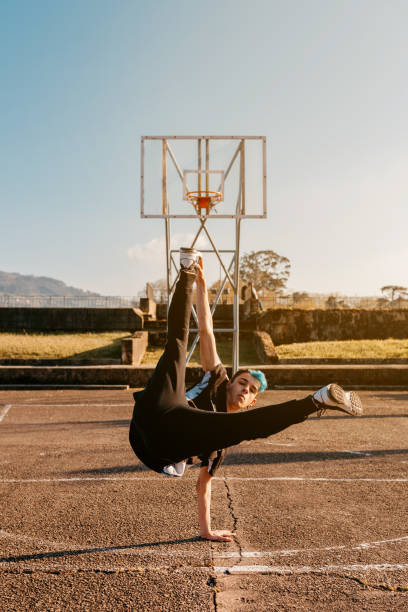 istock young man dancing in the street 1482983802