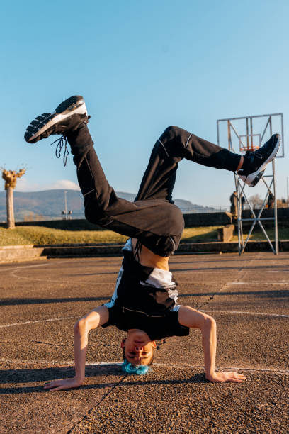istock teenage boy breakdancing 1482983818