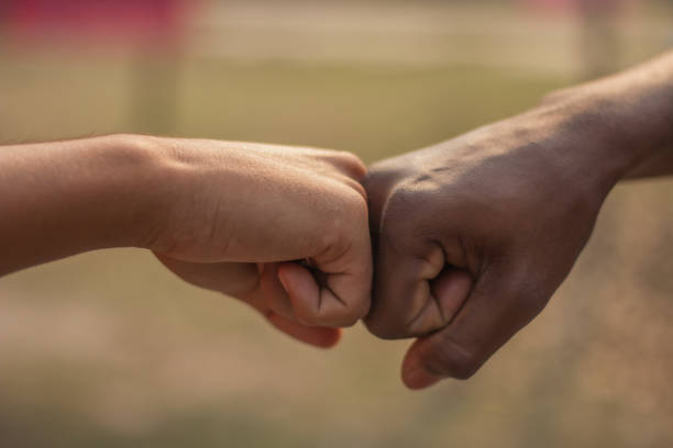 istock Two hands are wrapped together and the background is blurred 1482985125
