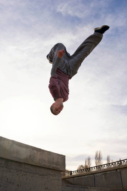 istock Man doing parkour. Extreme sports 1482986245