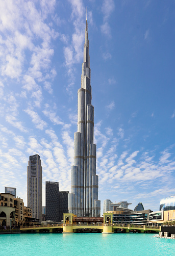 DUBAI, UNITED ARAB EMIRATES - JAN 13, 2023: The Burj Khalifa in the center of Dubai is the tallest building in the world with 828 meters high.