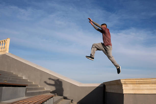istock Man doing parkour. Extreme sports 1482993853