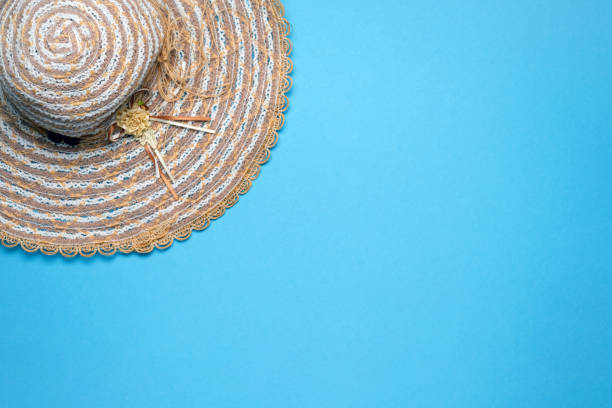 istock Summer and vacation flat lay with woman straw hat on blue background. 1482993991
