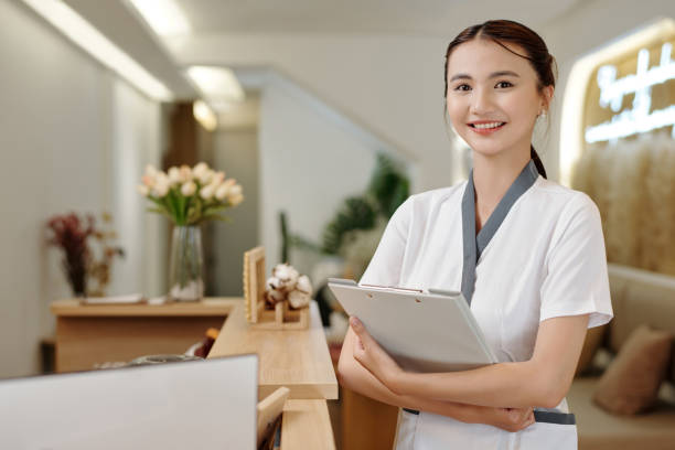 istock Positive Spa Salon Receptionist 1482994029